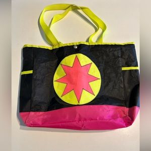 Waterproof tote bag; never used, stored in a bin for years